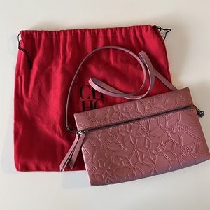 Carolina Herrera body bag. Comes with dust bag. Used once.